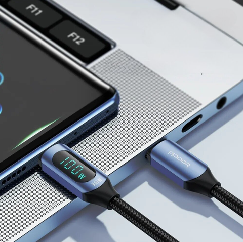 Fast Charging 100W Cable with USB C to USB C connectors, designed for ultra-fast charging and high-speed data transfer, compatible with a wide range of devices.