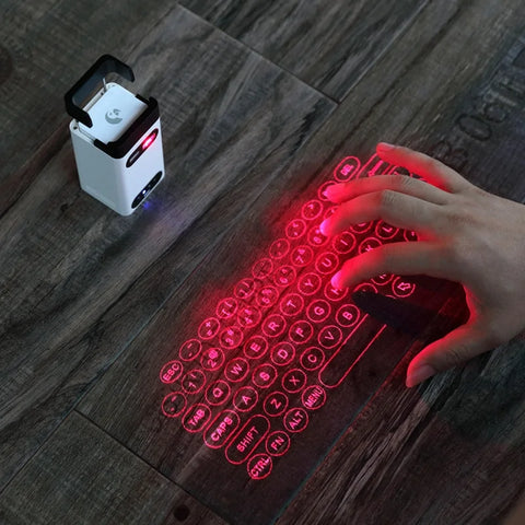 Experience the future of typing with the Virtual Laser Keyboard, a portable, Bluetooth-enabled device that projects a responsive keyboard onto any flat surface. Compatible with Android, Apple, smartphones, and PCs, it offers seamless connectivity and dual functionality as a keyboard and mouse.