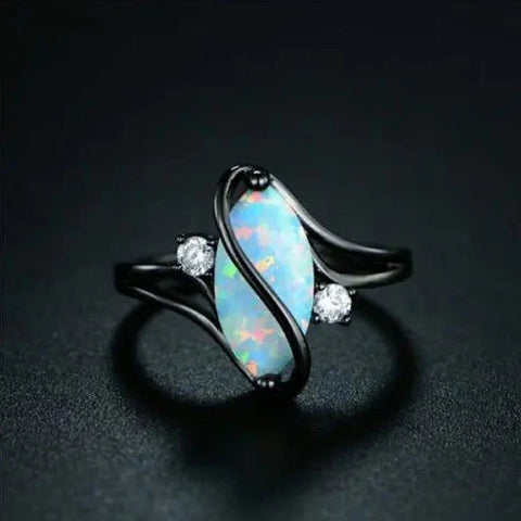 Luxurious Custom Crafted Opal Ring with a dazzling opal centerpiece and intricate design, perfect for special occasions and elegant gifting.