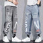 Korean Street Art Limited Pants featuring unique prints, elastic waistband, and loose fit, perfect for trendy and comfortable street style fashion.