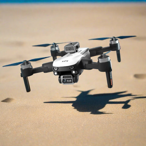 Compact S2S RC Quadcopter flying over sandy terrain, featuring a 4K/6K HD twin-camera for high-definition aerial photography and videography.