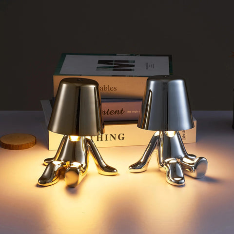 Little Man Innovative Designer Table Lamp with a playful, artistic design featuring a rechargeable battery, touch control, and dimmable lighting, perfect for modern home decor.