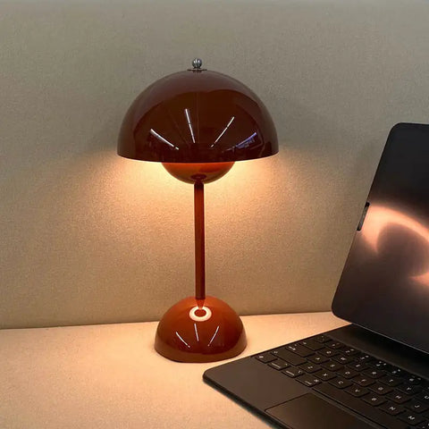 The Mångata Retro Table Lamp featuring a mid-century modern design, cordless operation with lithium-ion battery, and USB rechargeable convenience, perfect for stylish home illumination.